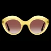 Gafa con tendencia a cat eye mostaza con estampado de hojas