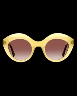 Gafa con tendencia a cat eye mostaza con estampado de hojas